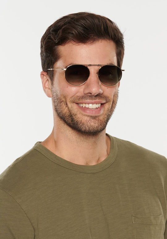 Krewe Rampart Fold Sunglasses In 12K + Green Tea