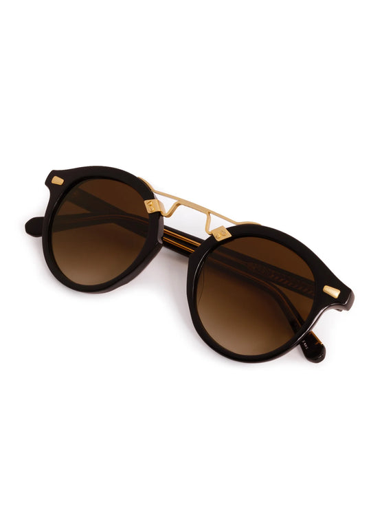 Krewe STL II Sunglasses In Black + Black Tea 18K