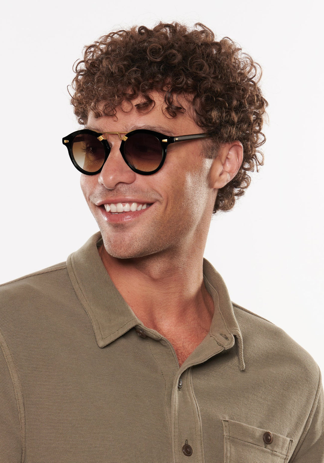 Krewe STL II Sunglasses In Black + Black Tea 18K